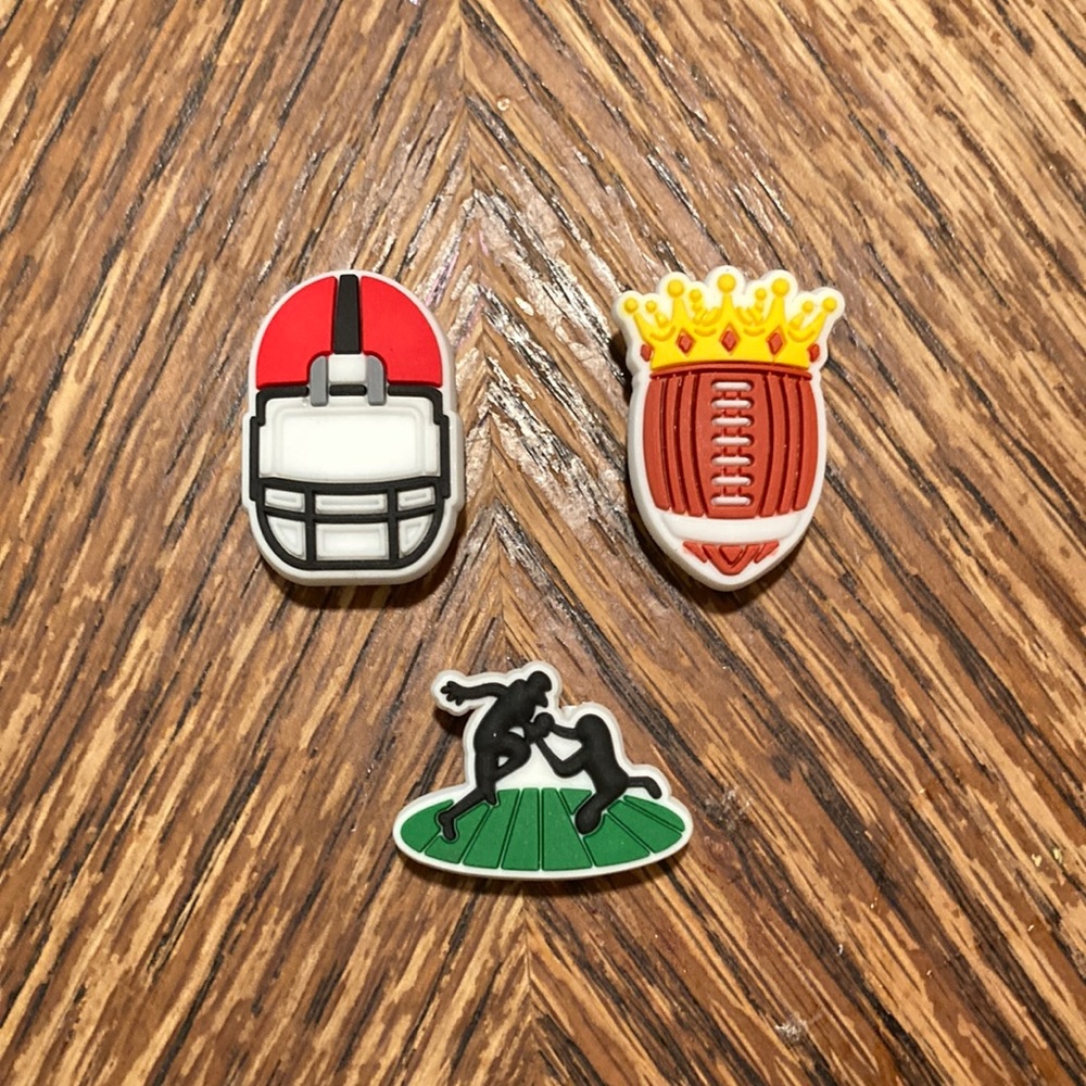 3 Jibbitz - Helmet, Crown, & Players! Get them now for your Crocs or Clogs!